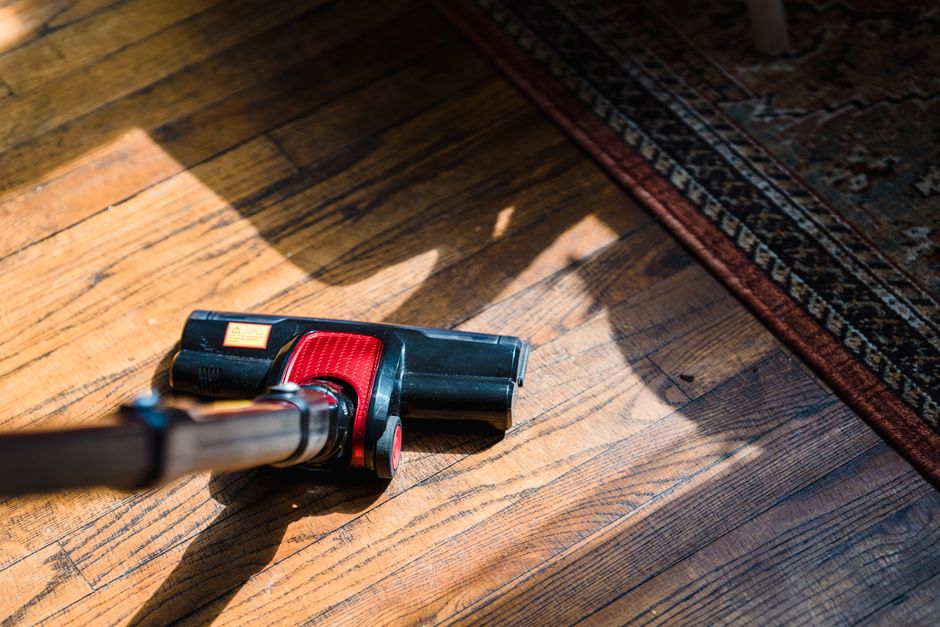 Close up of professional vacuuming and carpet cleaning